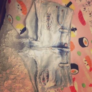 ripped blue jean shorts